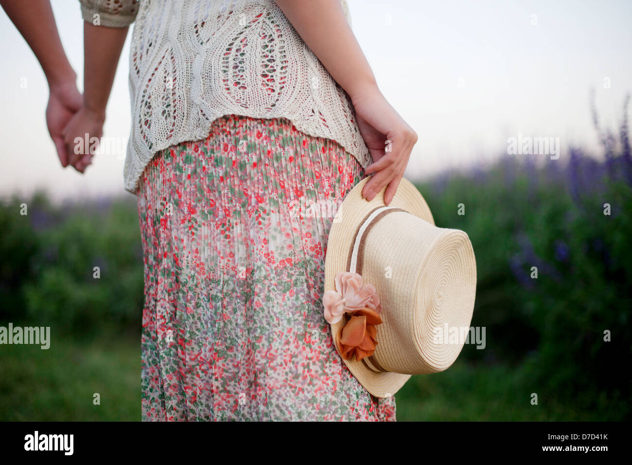 Chinese couple walking holding hi-res stock photography and images - Alamy
