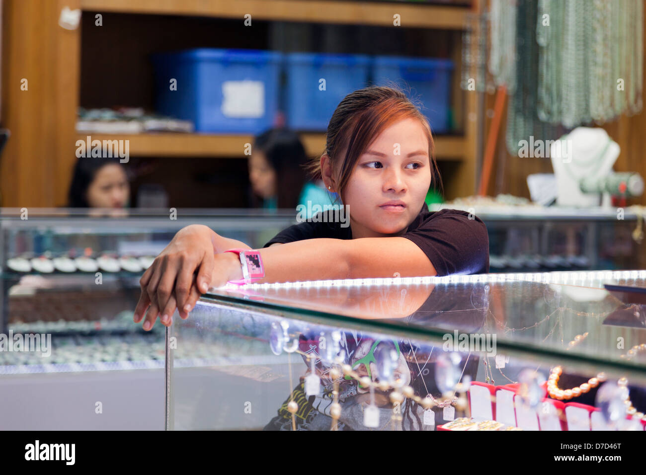 A young Burmese girl in jewellery store in Bogyoke (formerly Scott) Market in Yangon, Myanmar Stock Photo