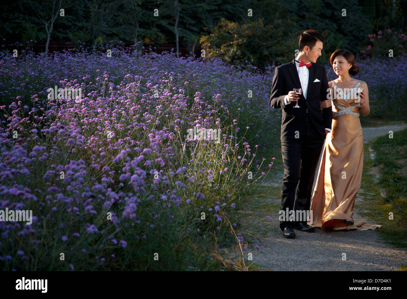 Wearing evening dress fashion of young man and woman in the private ...