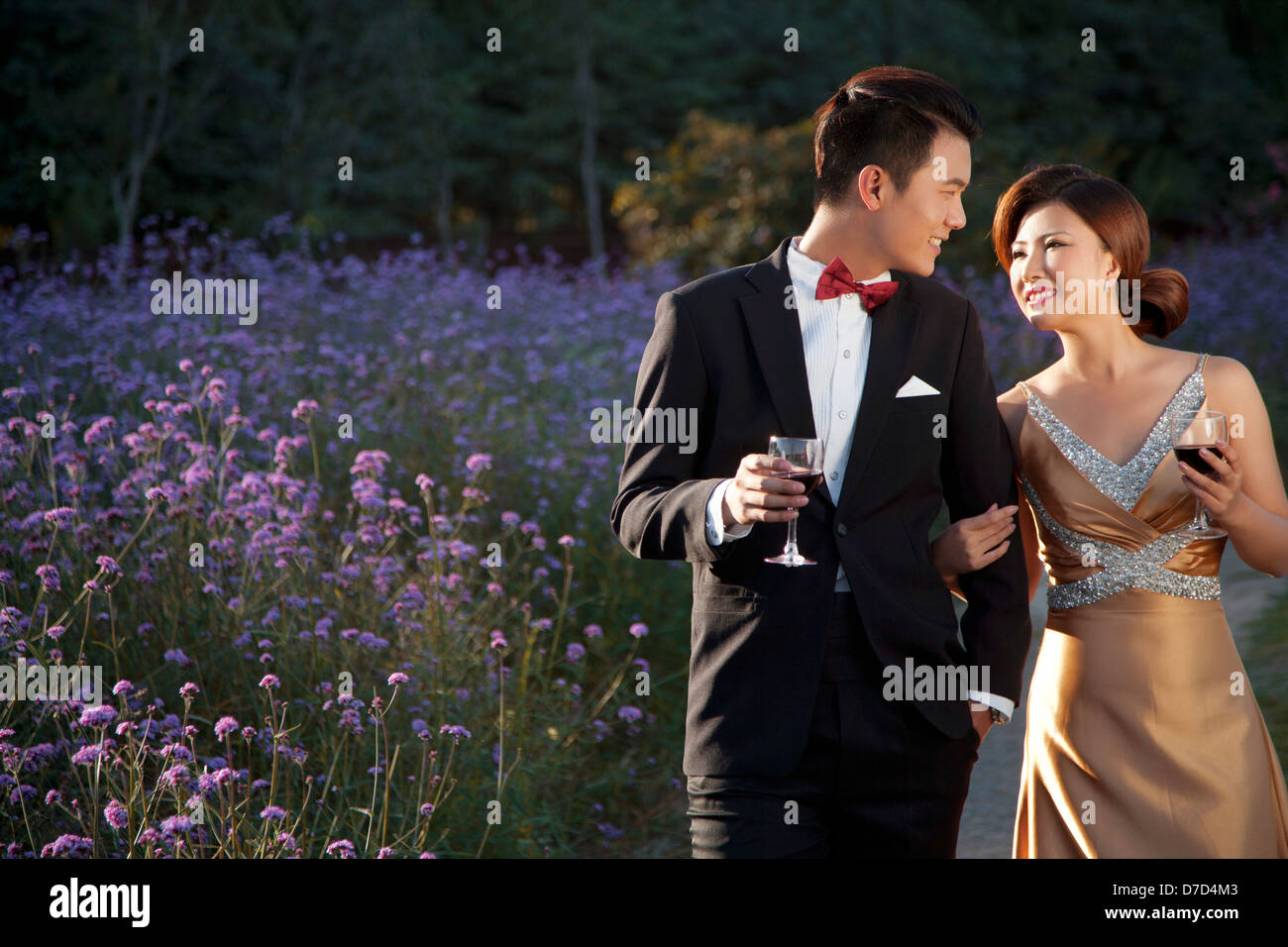 Wearing evening dress fashion of young man and woman in the private ...