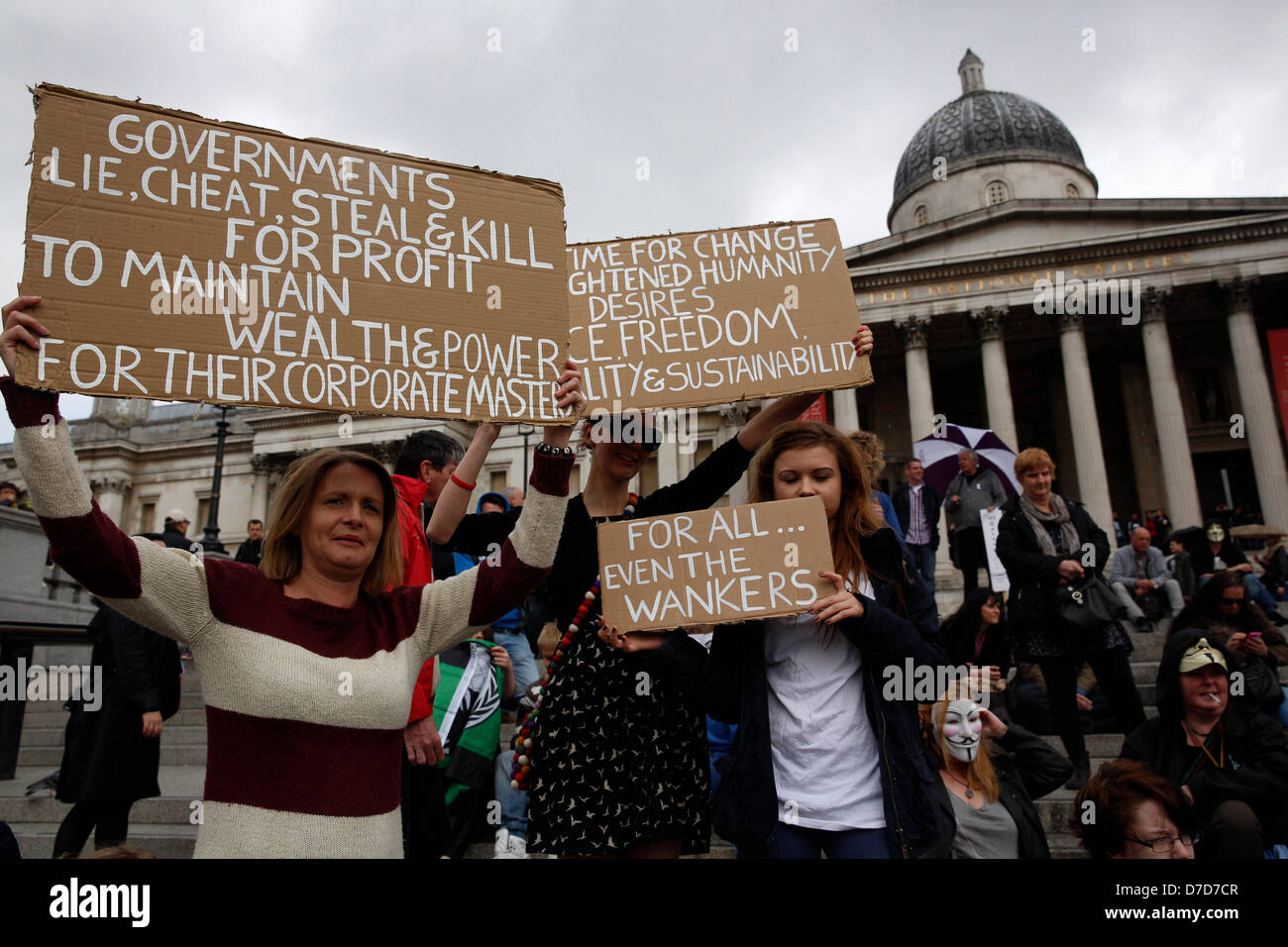 London, UK. 4th March 2013. The anonymous protesters gathered at Trafalgar Square to protest against austerity and government cuts. Around 300 people showed up to protest with self made banners against government cuts. Credit:  Lydia Pagoni / Alamy Live News Stock Photo