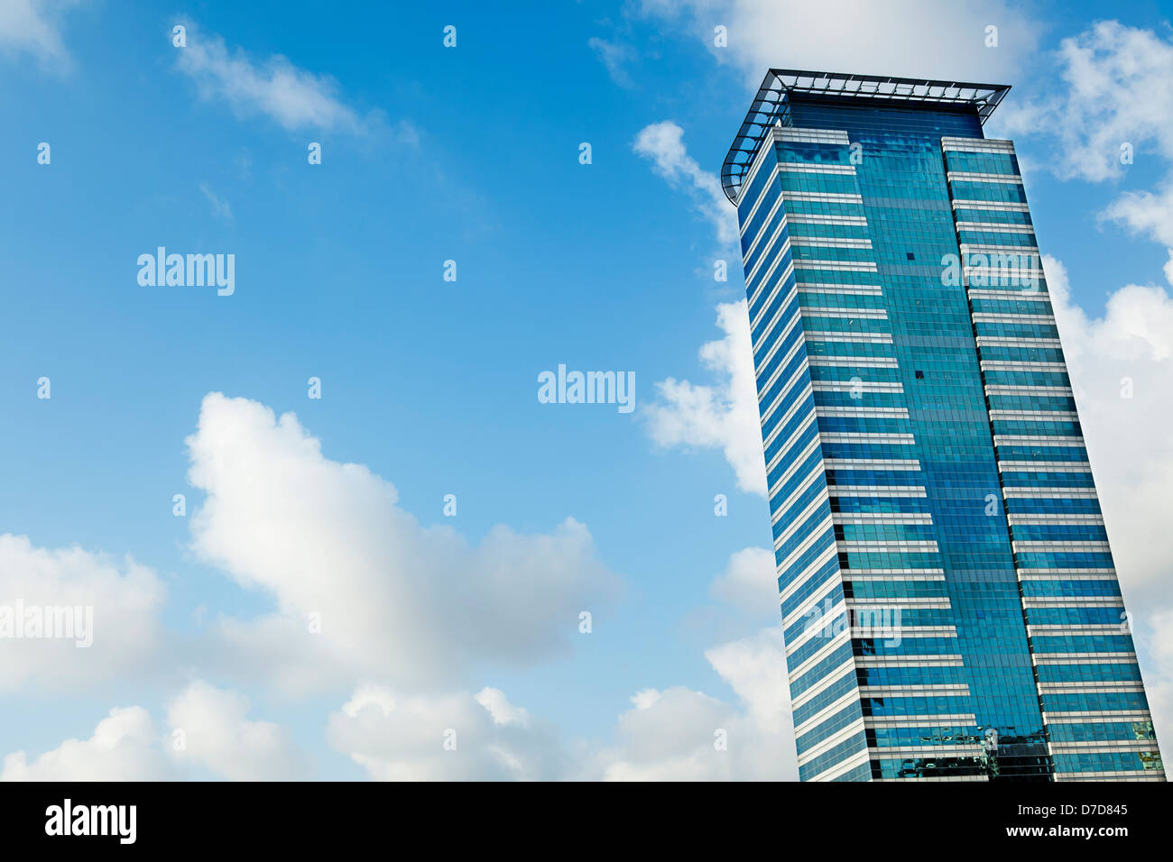 A modern office building on a cloudy day Stock Photo - Alamy