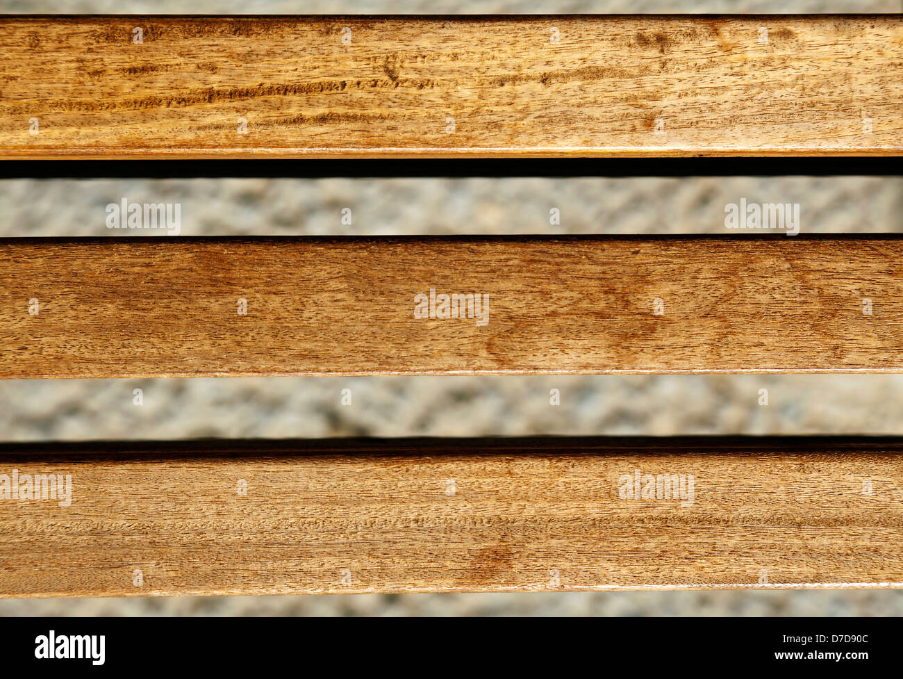 Sunlit wooden beams on blurry background. Stock Photo
