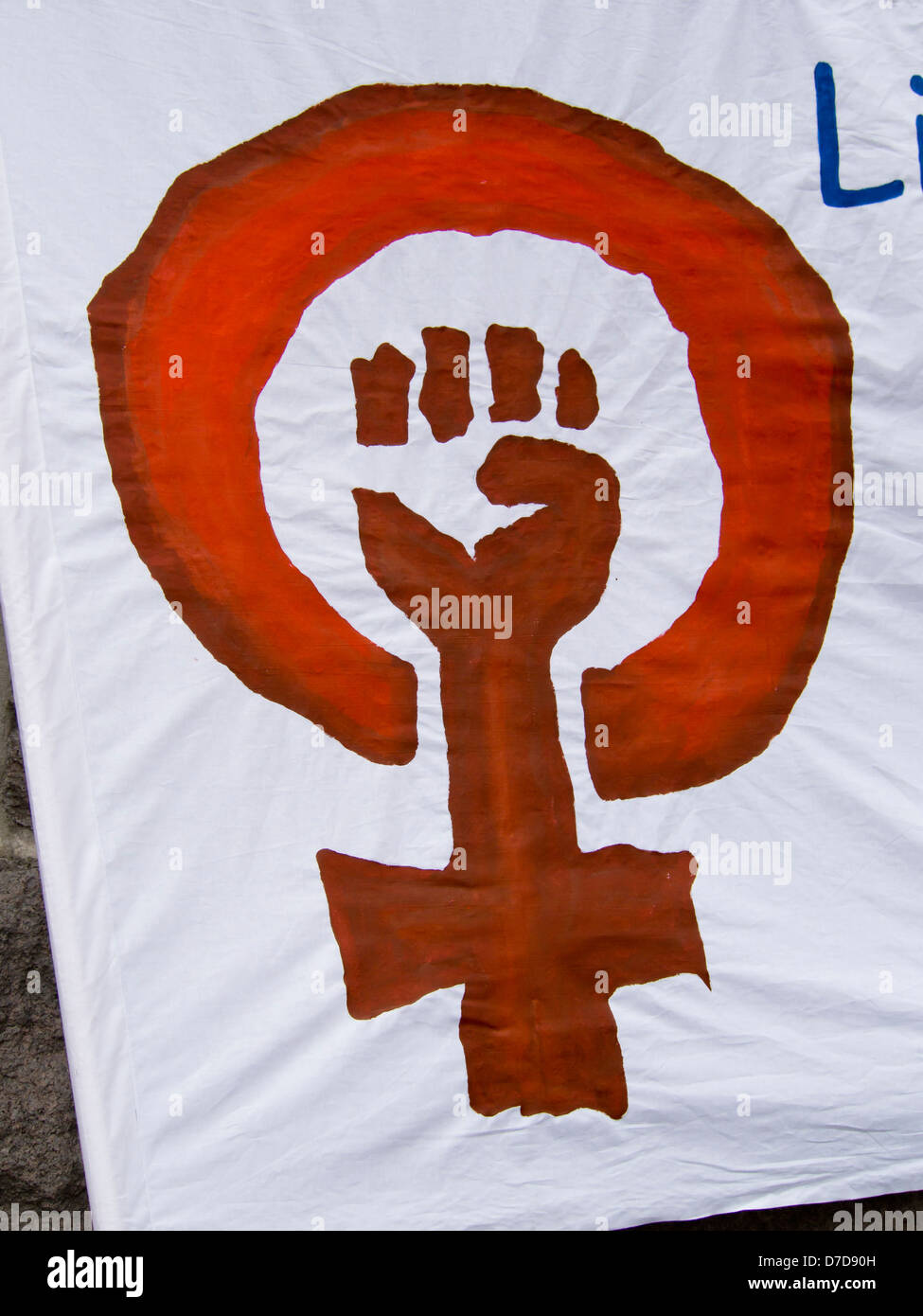 May 1 2013, labour day celebrations in Oslo Norway, equal rights, women power symbol on banner, closed fist Stock Photo
