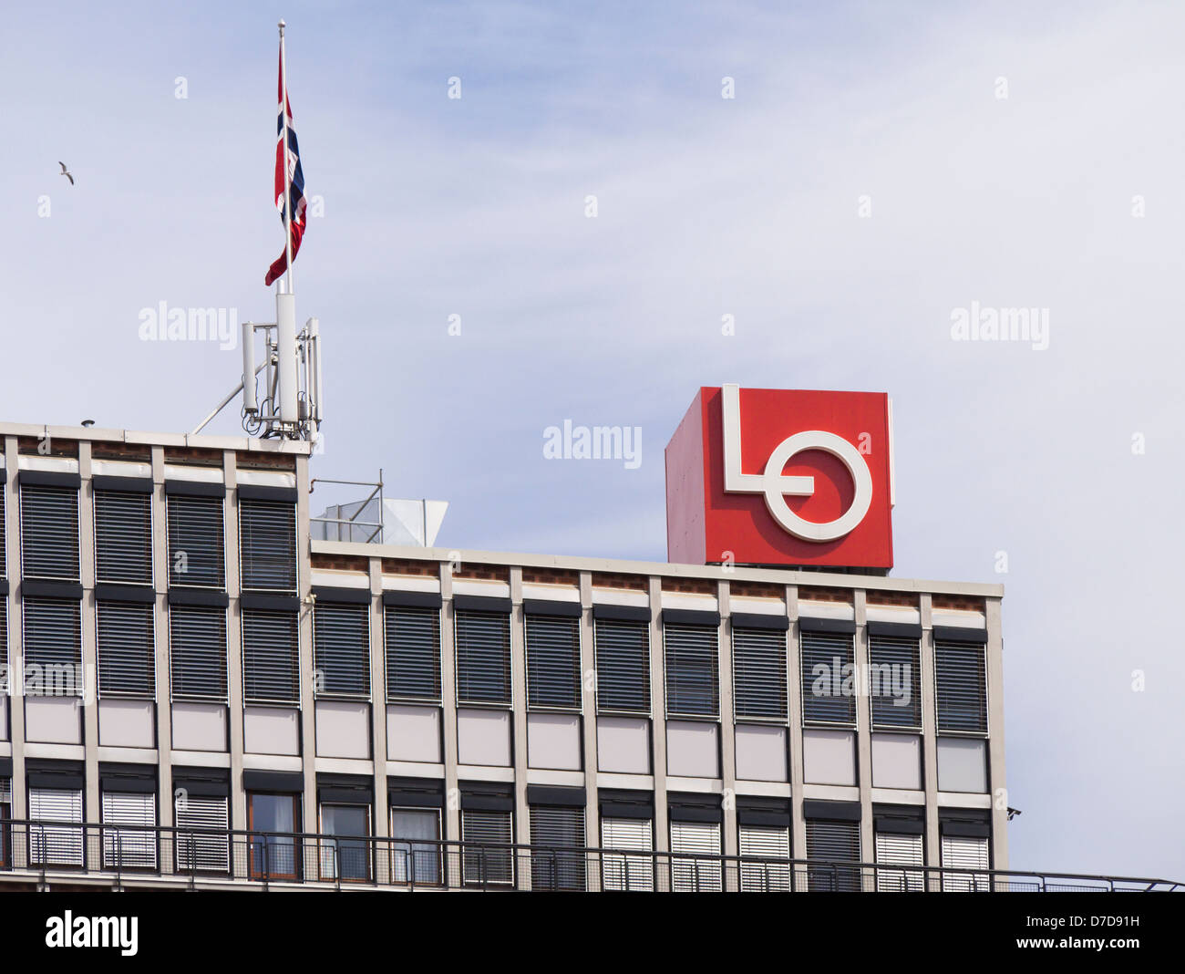 May 1 2013, labour day celebrations in Oslo Norway, Norwegian flag and Labor union logo on top of building Stock Photo