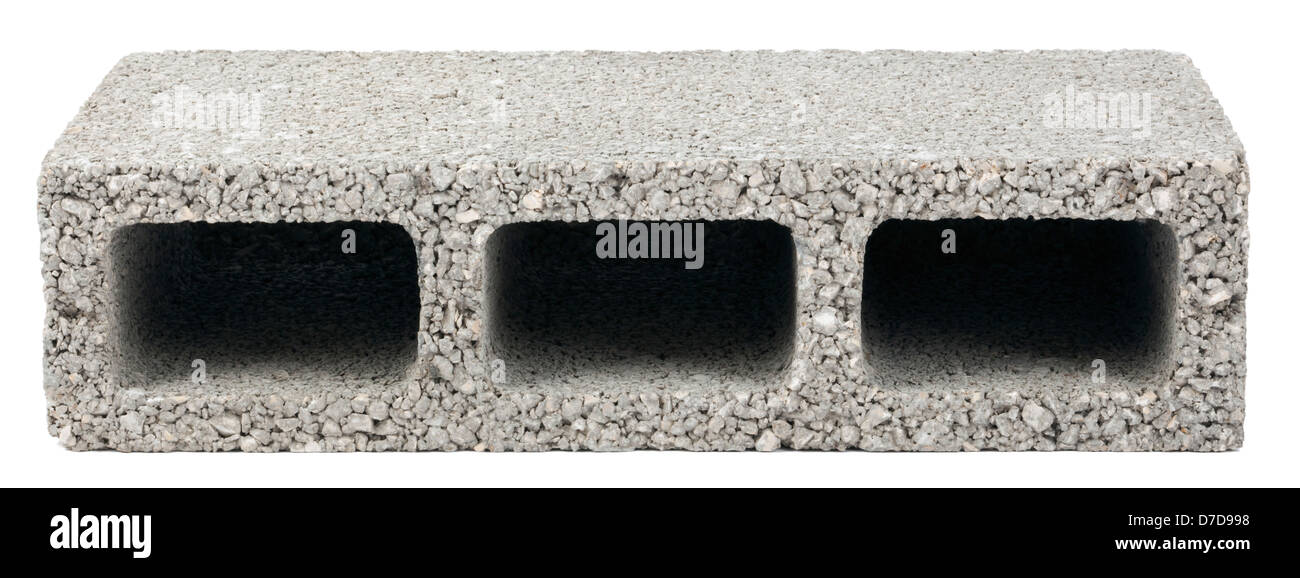 Gray concrete construction block (a.k.a. cinder block breeze block cement block foundation block besser block; professional Stock Photo