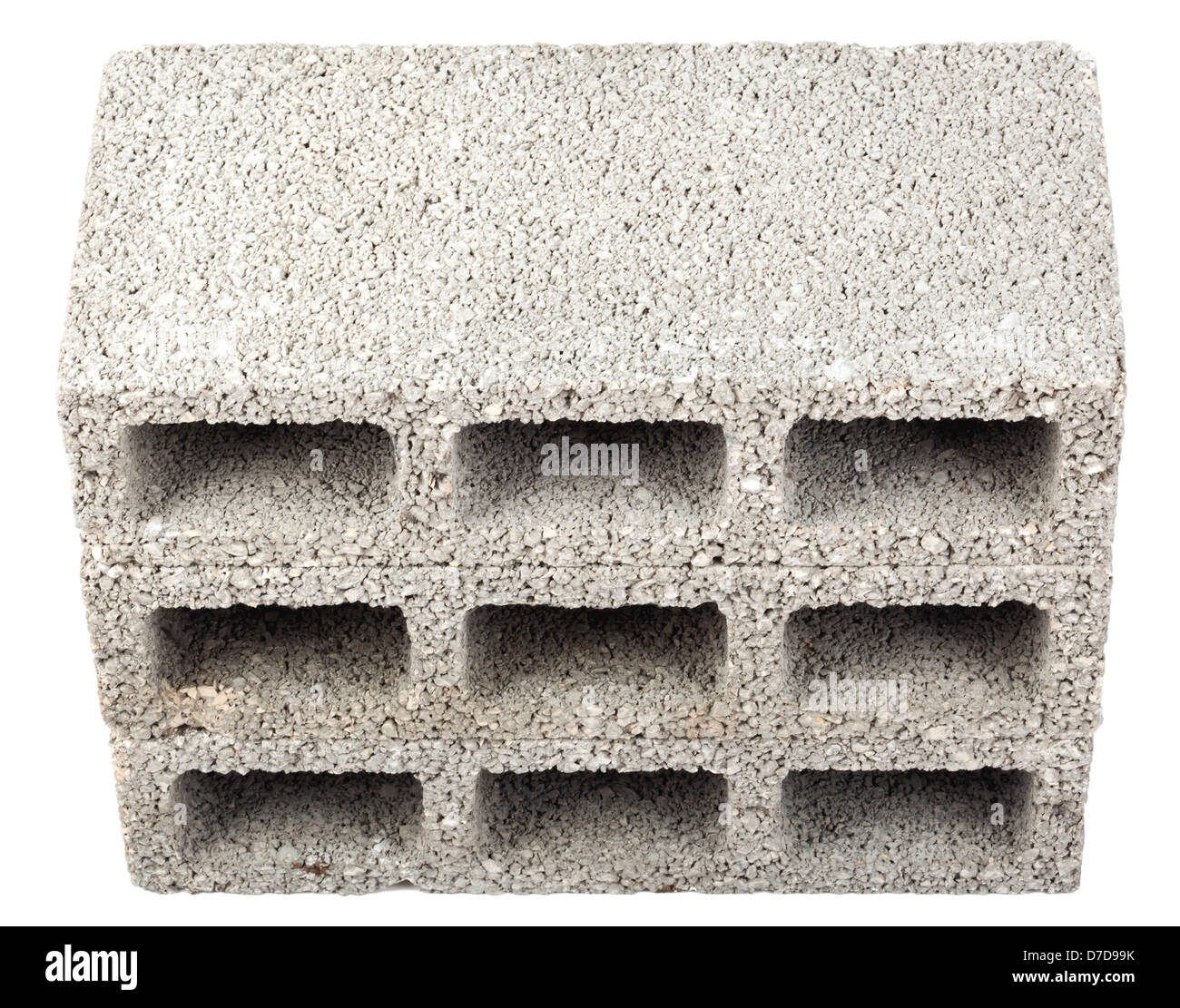 High angle view three gray concrete construction blocks (a.k.a. cinder block breeze block cement