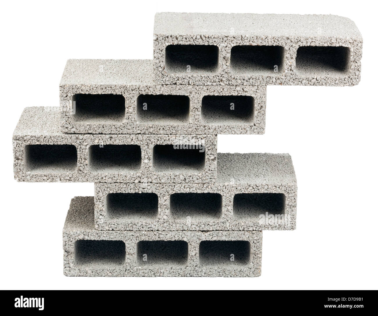 Five gray concrete construction blocks (a.k.a. cinder block breeze