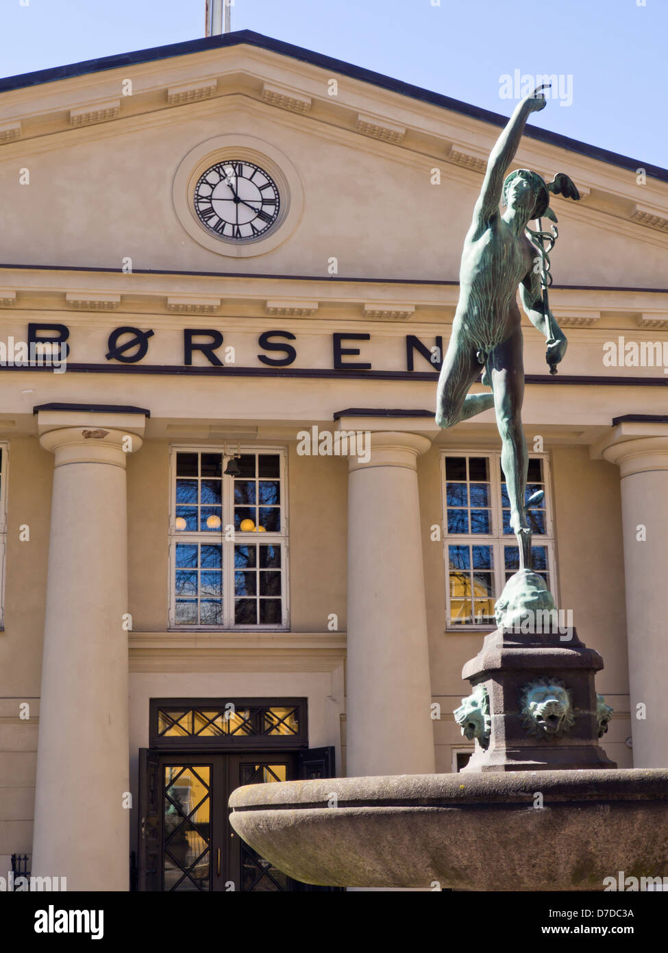 The Oslo Stock exchange , Børsen, centrally located in Norway's capital with a sculpture depicting the god Mercury in front Stock Photo