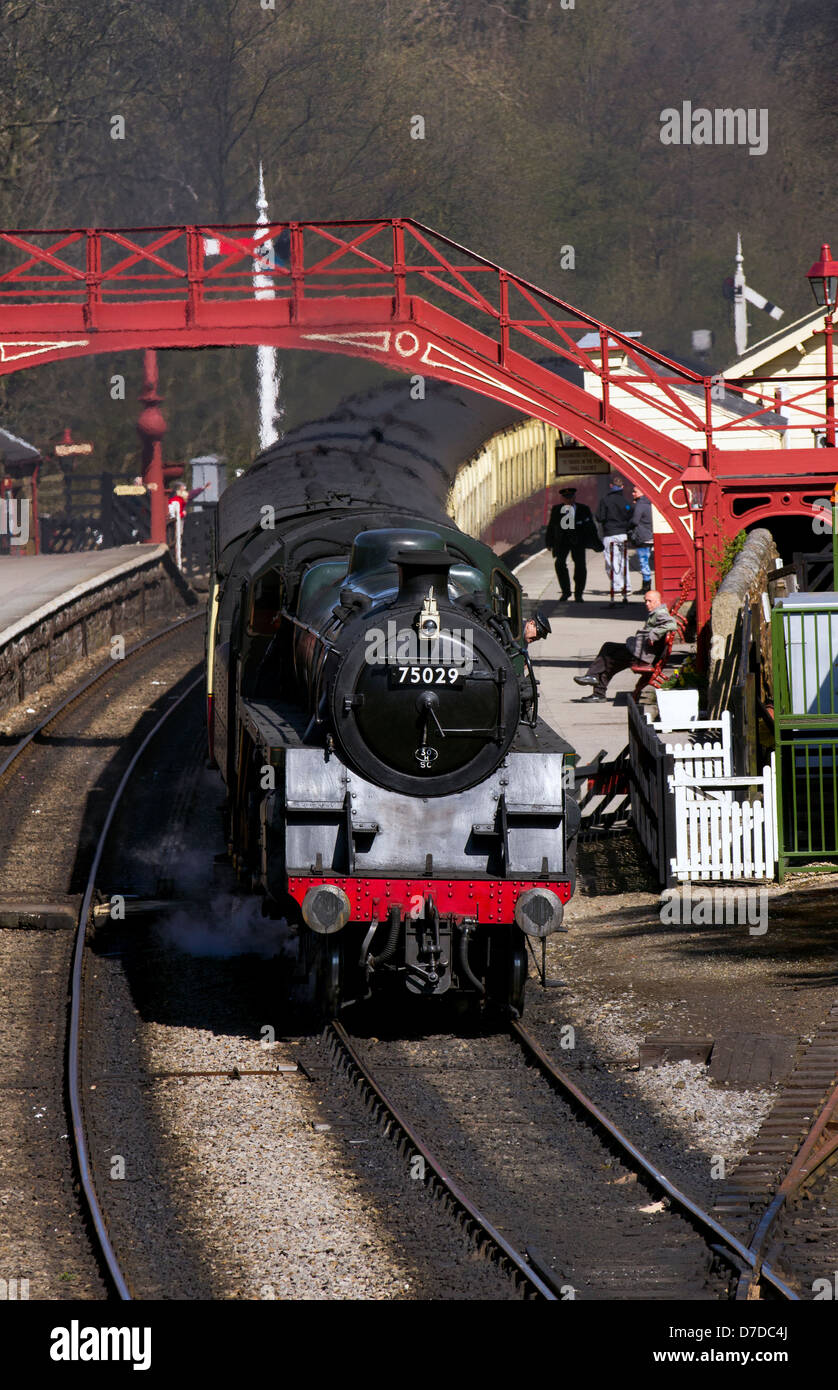 1950s BR standard 4MT locomotive 75029 THE GREEN KNIGHT hauling coaching stock on 40th anniversary of the North Yorkshire Moors Railway, Goathland, UK Stock Photo