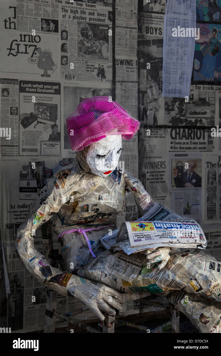 Newspaper; Statue of Papiermâché female figure, Exhibit and creations