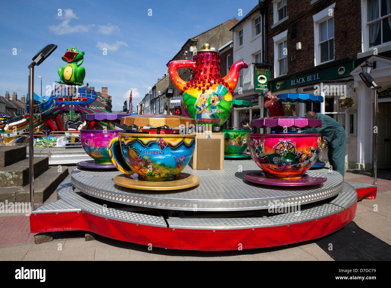 Amusements, Carousel Fun-Fair rides and fun attractions at the Northallerton Town Centre annual May Street Fair, High Street, North Yorkshire, UK Stock Photo