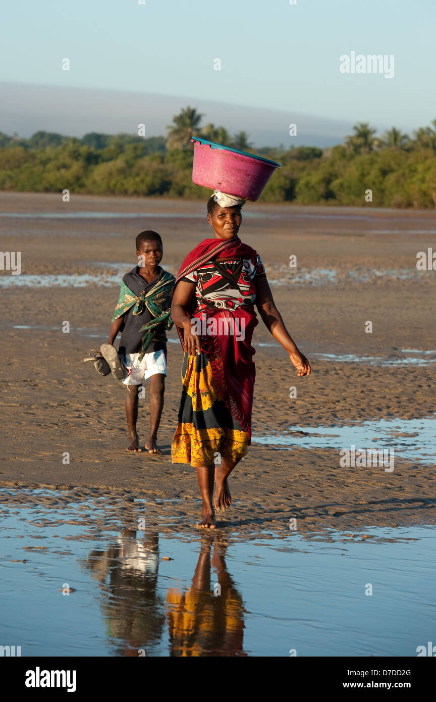 African village woman walking hi-res stock photography and images - Alamy