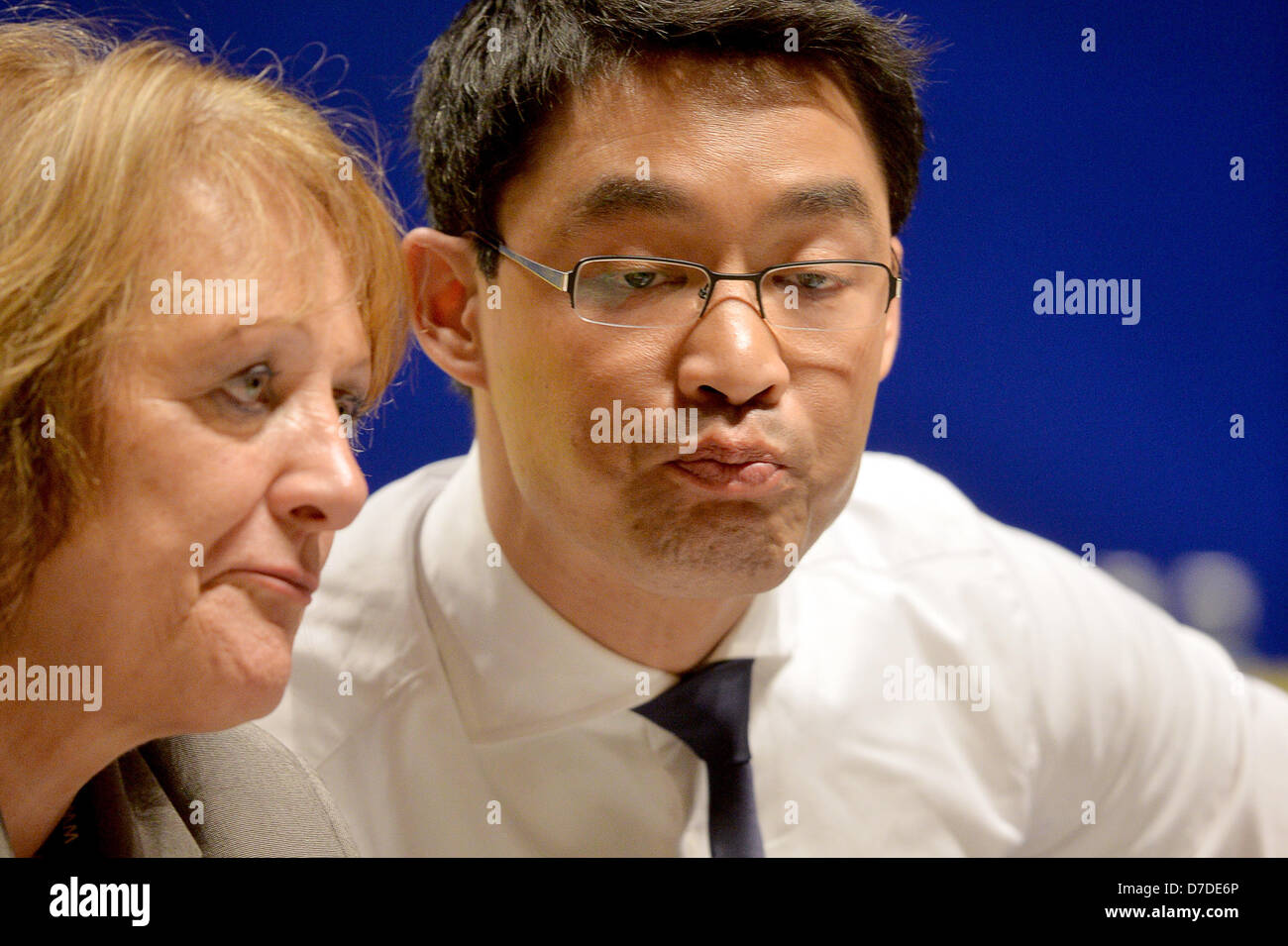 FDP Federal leader Philipp Roesler gestures next to Federal Minister of Justice Sabine Leutheusser-Schnarrenberger during the FDP Federal Party Convent in Nuernberg, Germany, 04 May 2013. PHOTO: BERND VON JUTRCZENKA Stock Photo