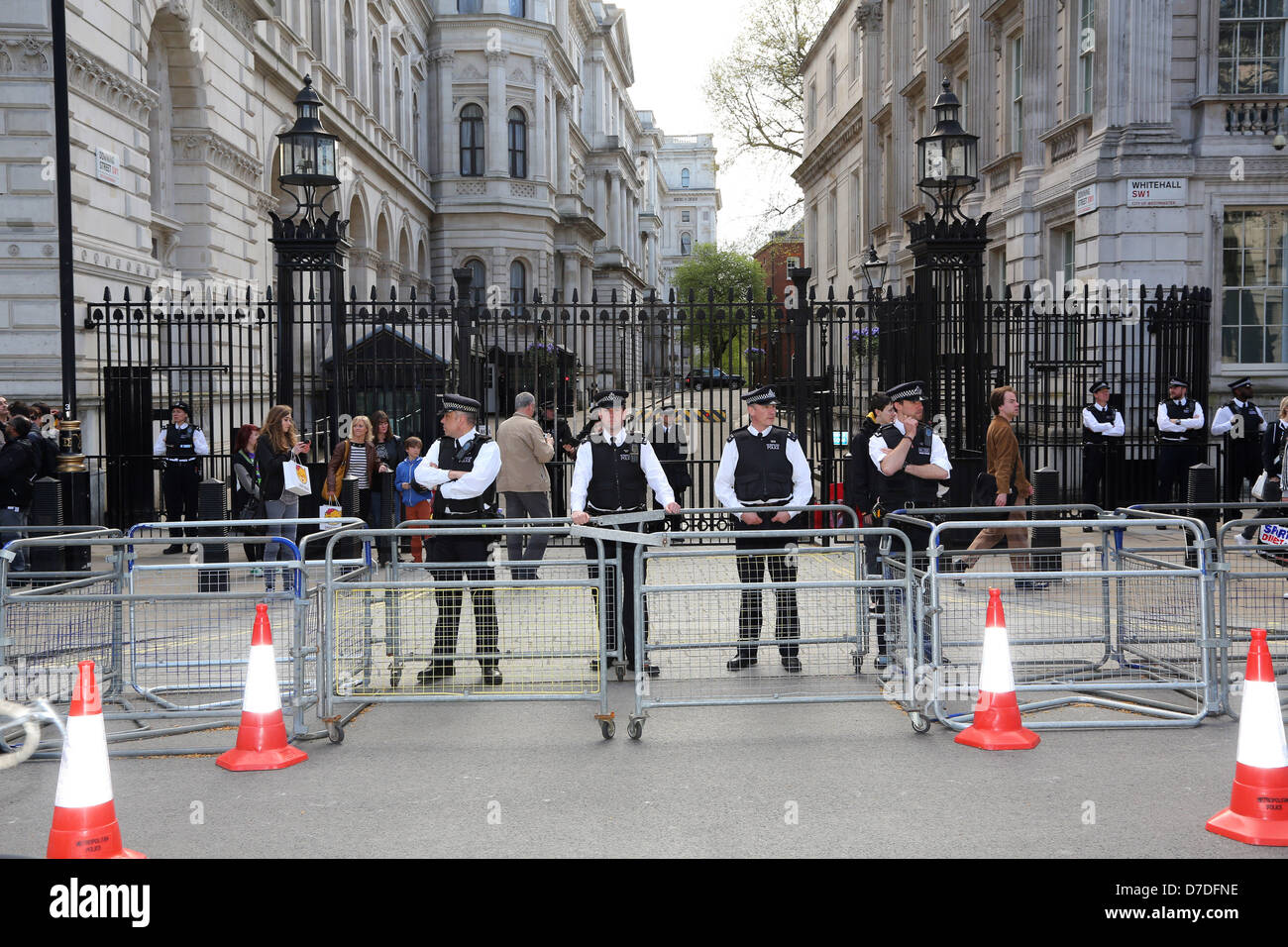 London, UK. 4th May 2013. Protestors blocked by Police at the Anonymous UK anti-austerity demonstration protecting Downing Streetl, London, England. Credit:  Paul Brown / Alamy Live News Stock Photo