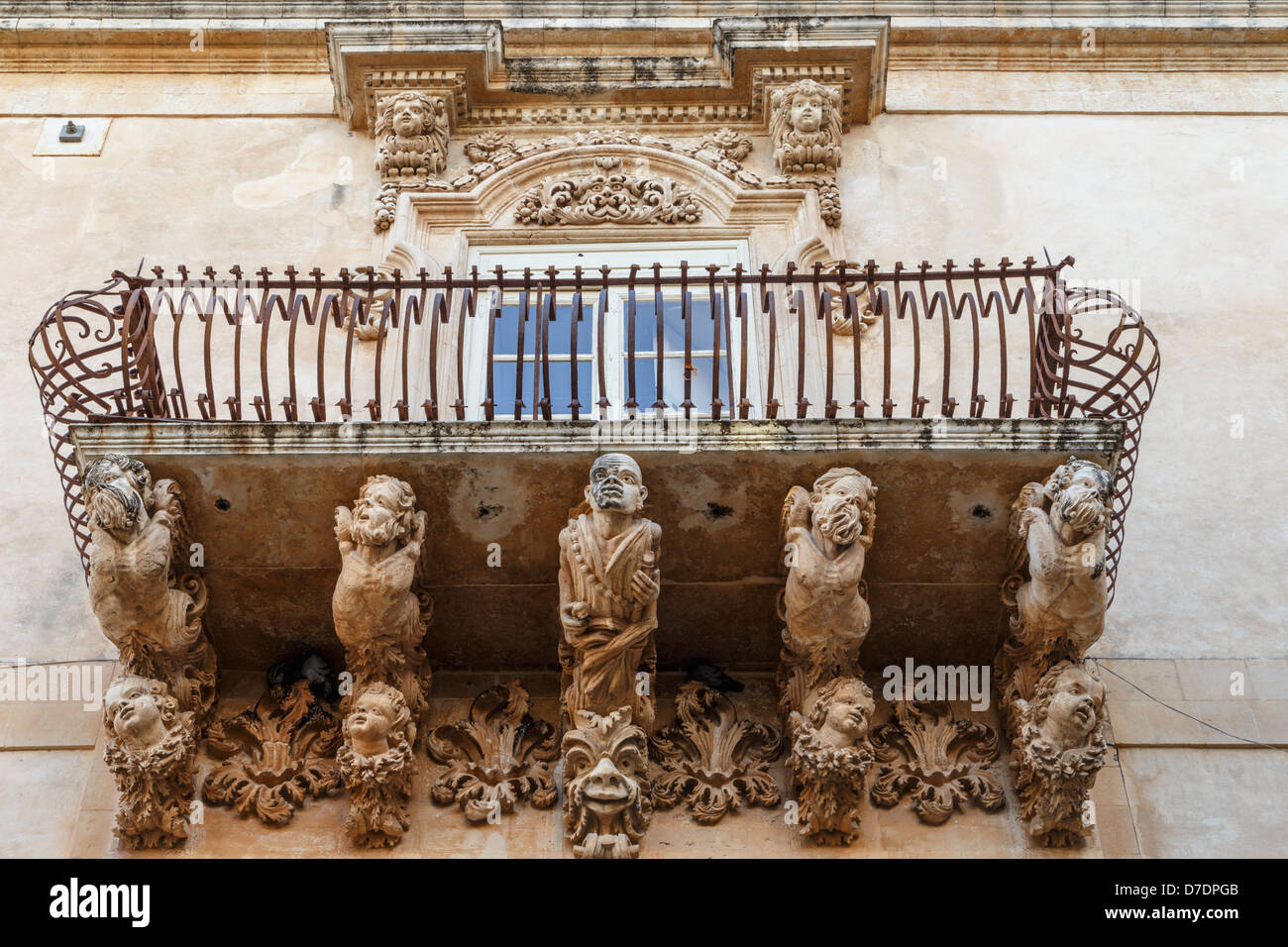 Baroque balcony of Palazzo Nicolaci di Villadorata, Noto, Sicily Stock