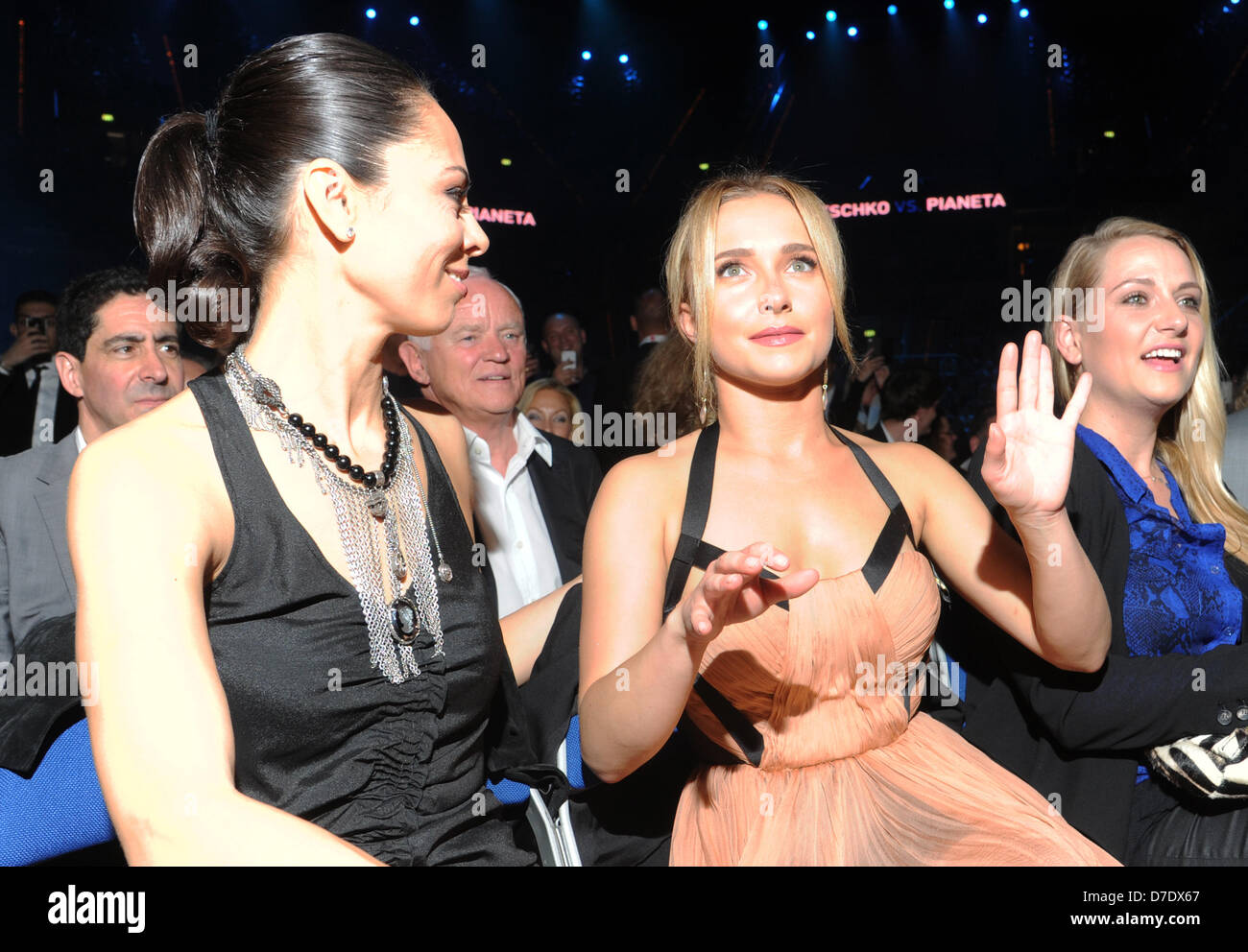US actress Hayden Panettiere (C) and wife of Vitali Klitschko, Natali (L), attend the boxing fight between Ukrainian heavyweight IBF, WBO and IBO world champion Wladimir Klitschko and German-Italian challenger Francesco Pianeta at SAP Arena in Mannheim, Germany, 04 May 2013. Klitschko won the fight in the sixth round by knock out. Photo: Uli Deck Stock Photo