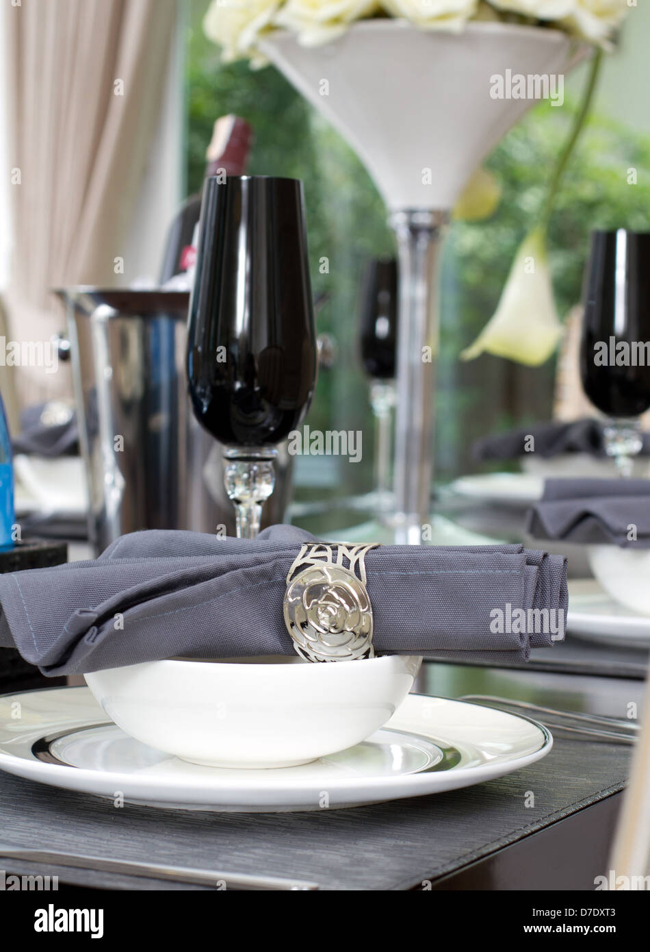 Dinner table setting with wine and luxury wine glasses Stock Photo