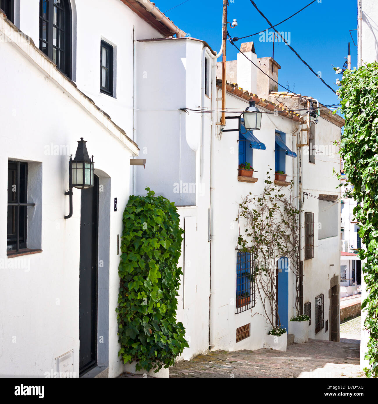 Typical narrow street in Calella de Palafrugell, costa Brava, Catalonia Stock Photo