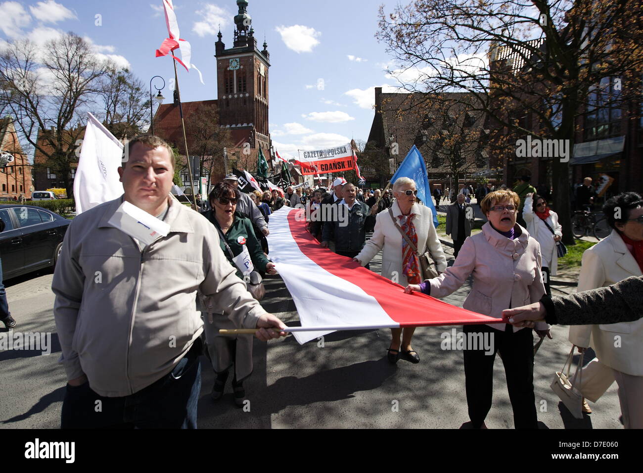 Gdansk, Poland 5th, May 2013 Demostration against expansion of homosexuality organized by the Law and Justice (PiS) party supporters, catholics and nacionalists. People with Polish flags and anti-gay banners goes from St. catherina church to the King Jan II Sobieski monument. Stock Photo