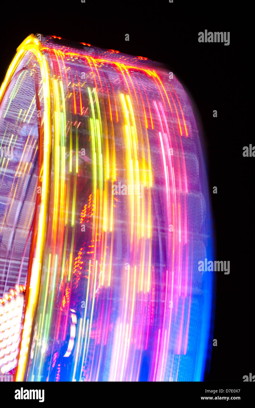 Spinning fairground ride lights Stock Photo Alamy