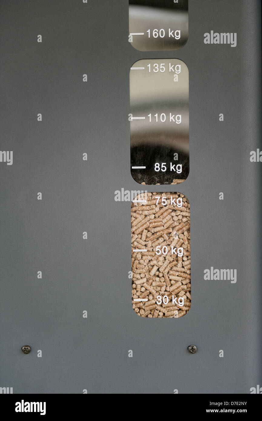 Modern stove using ecological alternative fuel wood pellets Stock