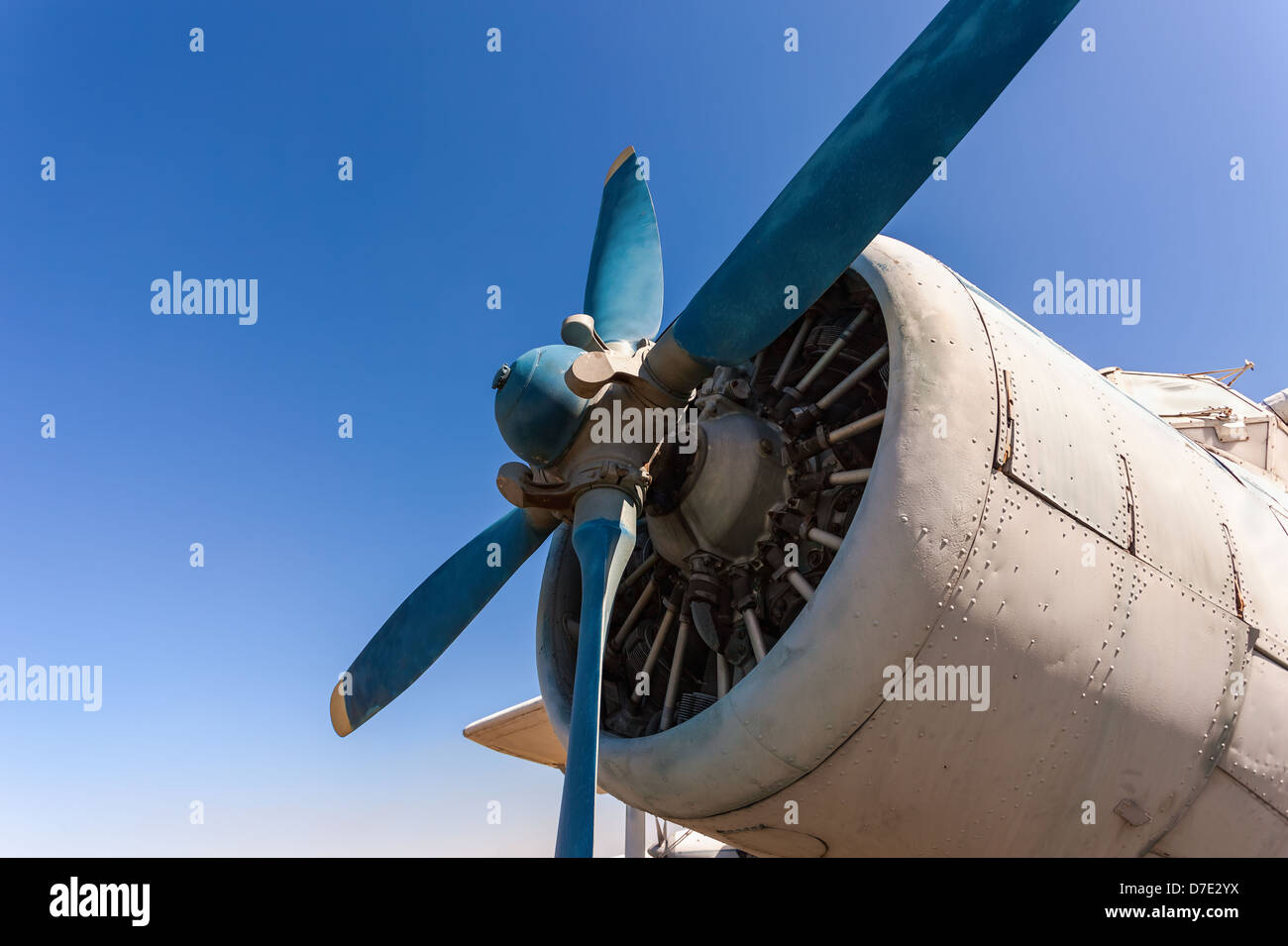 Propeller and engine of old airplane against blue sky Stock Photo - Alamy