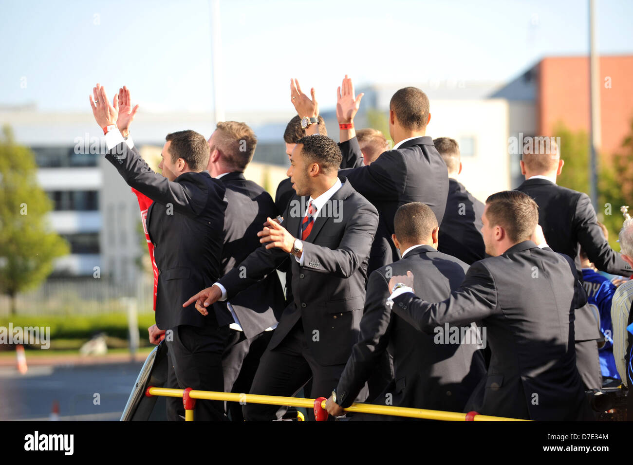 Cardiff, UK. 5th May 2013. Cardiff City FC players show off their Championship trophy to thousands of fans gathered to show their support. The team were paraded through the city in an open top bus after winning the Championship and being promoted to the Premier League. Credit: Polly Thomas/Alamy Live News Stock Photo