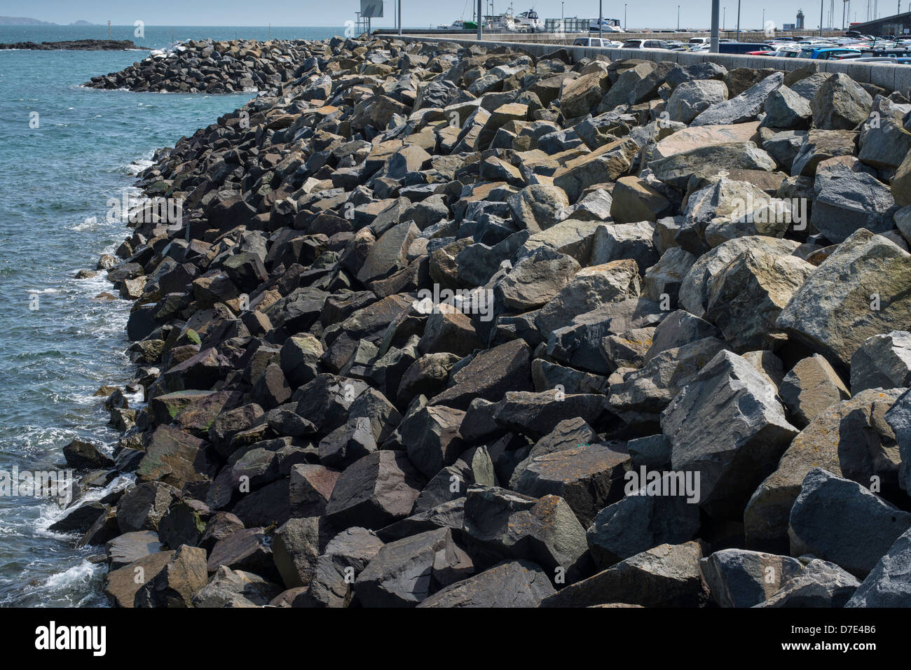Rock armour sea defenses in St Peter Port, Guernsey. Stock Photo