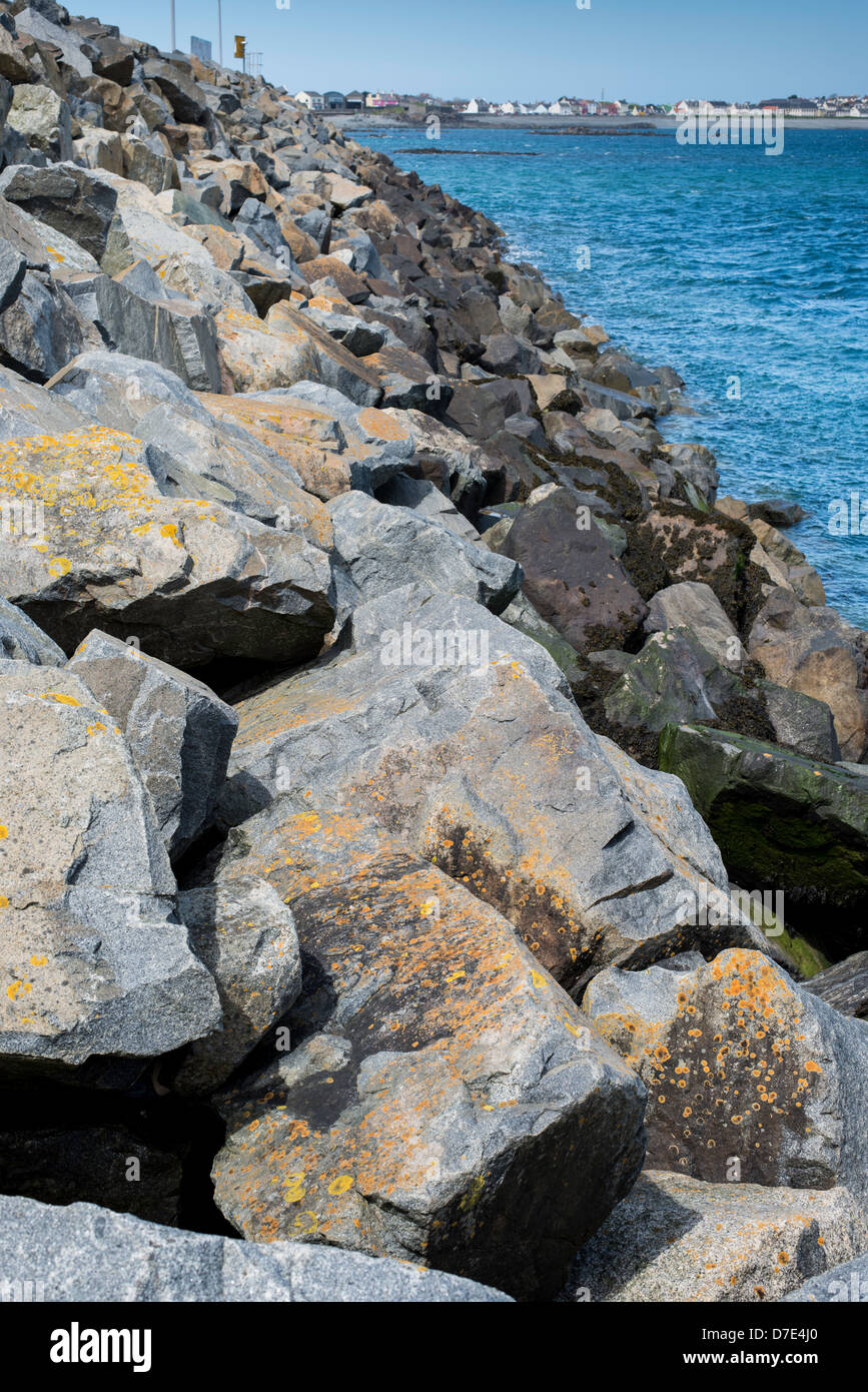 Rock armour sea defenses in St Peter Port, Guernsey. Stock Photo