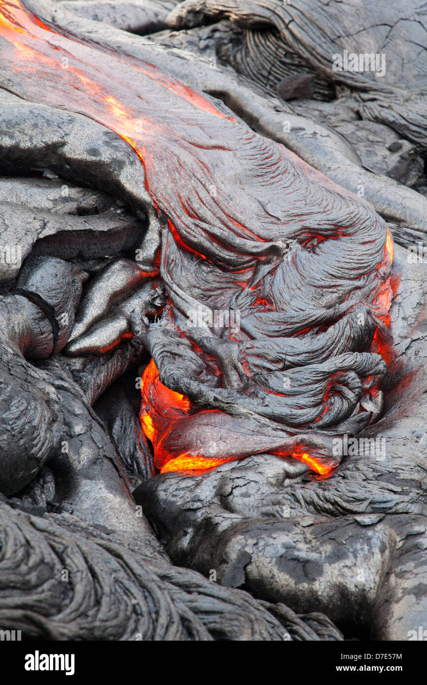 Lava flowing through the Royal Gardens subdivision on the Big Island of