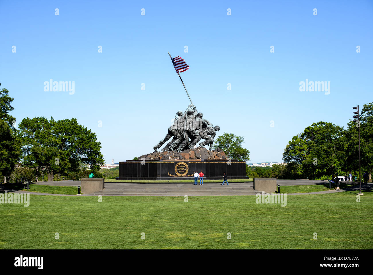 A wide-angle shot of the western face of the Iwo Jima Memorial (formally the Marine Corps War Memorial) in Arlington, Virginia, next to Arlington National Cemetery. The monument was designed by Felix de Wledon and is based on an iconic Associated Press photo called the Raising the Flag on Iwo Jima by Joe Rosenthal. It was dedicated in 1954. Stock Photo
