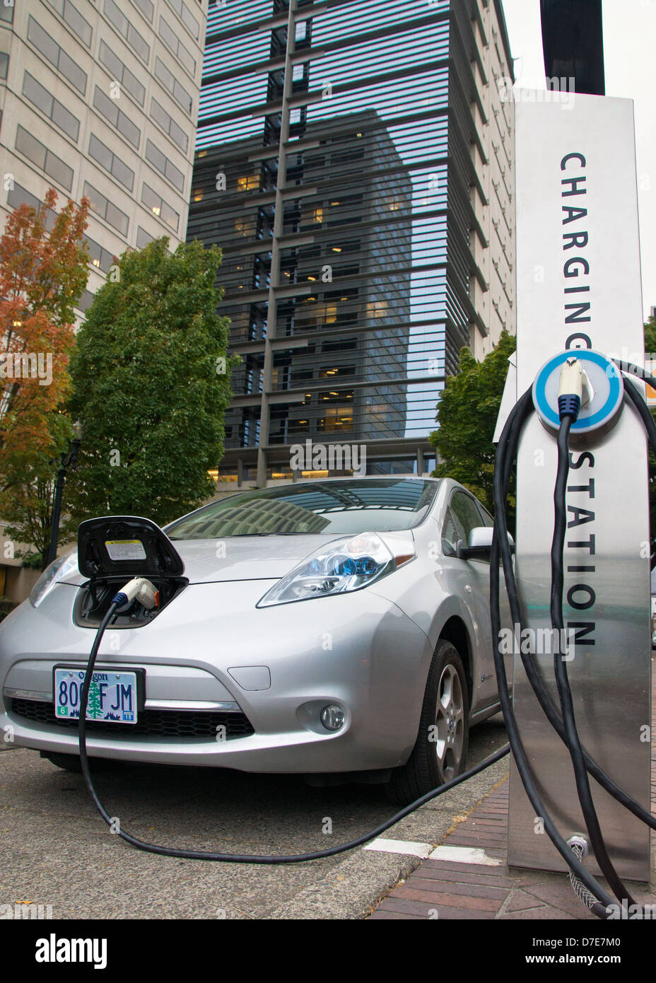 An electric car is charging outside the World Trade CenterConference