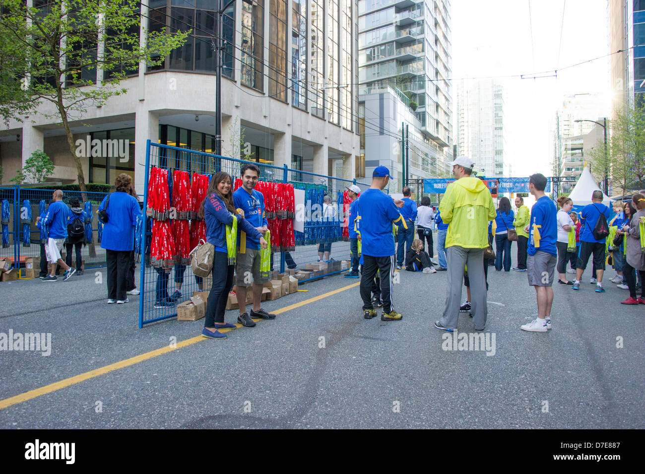 Vancouver, Canada. 5th May 2013. Volunteers at the finish of the 2013 BMO 42th Annual Vancouver Marathon  at  Vancouver British Columbia Canada on May 5 2013 . Photographer Frank Pali/Alamy Live News Stock Photo