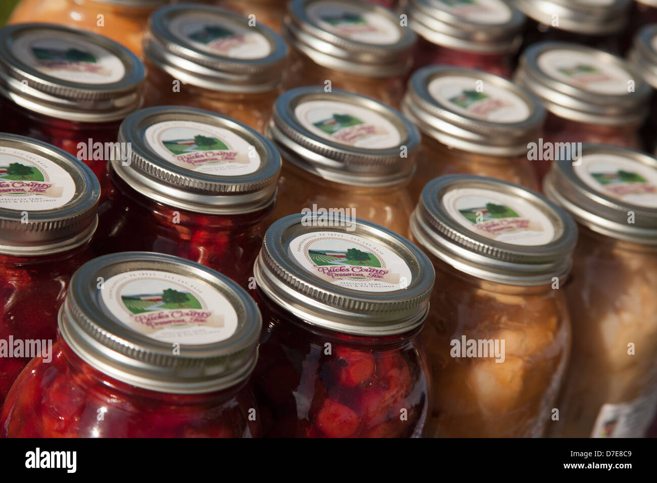 Jars of fruit preserves, outdoor display, farmer's market, Ottsville, Bucks County, PA USA Stock Photo