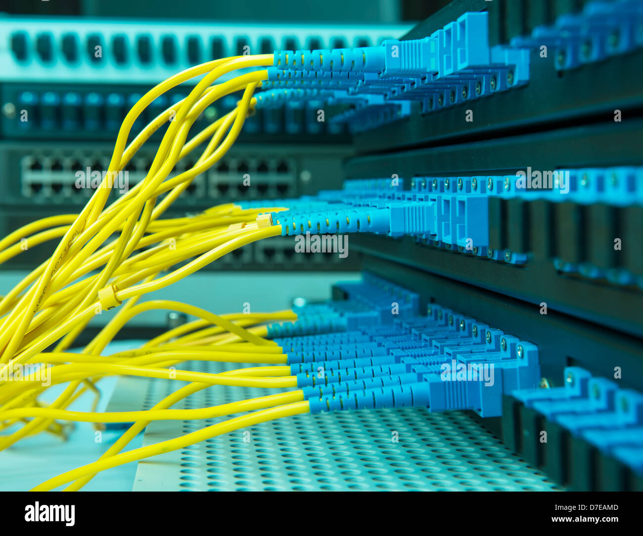 optic fiber cables connected to data center Stock Photo