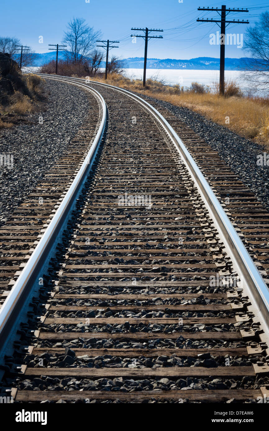 Railroad along shoreline of Upper Klamath Lake in southern Oregon Stock Photo