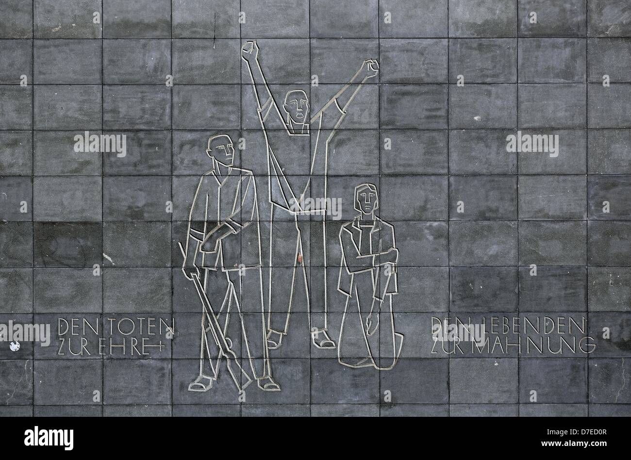 'To honour the dead and remind the living' is written on the memorial to the victims of fascism in Zwickau, Germany, 18 April 2013. The memorial has been errected in 1948, in 1965, it was reconstructed. At the monument, the remains of 325 victims of the Nazis are buried. Recently, there have been proposals to reshape the plant. Photo: Jan Woitas Stock Photo