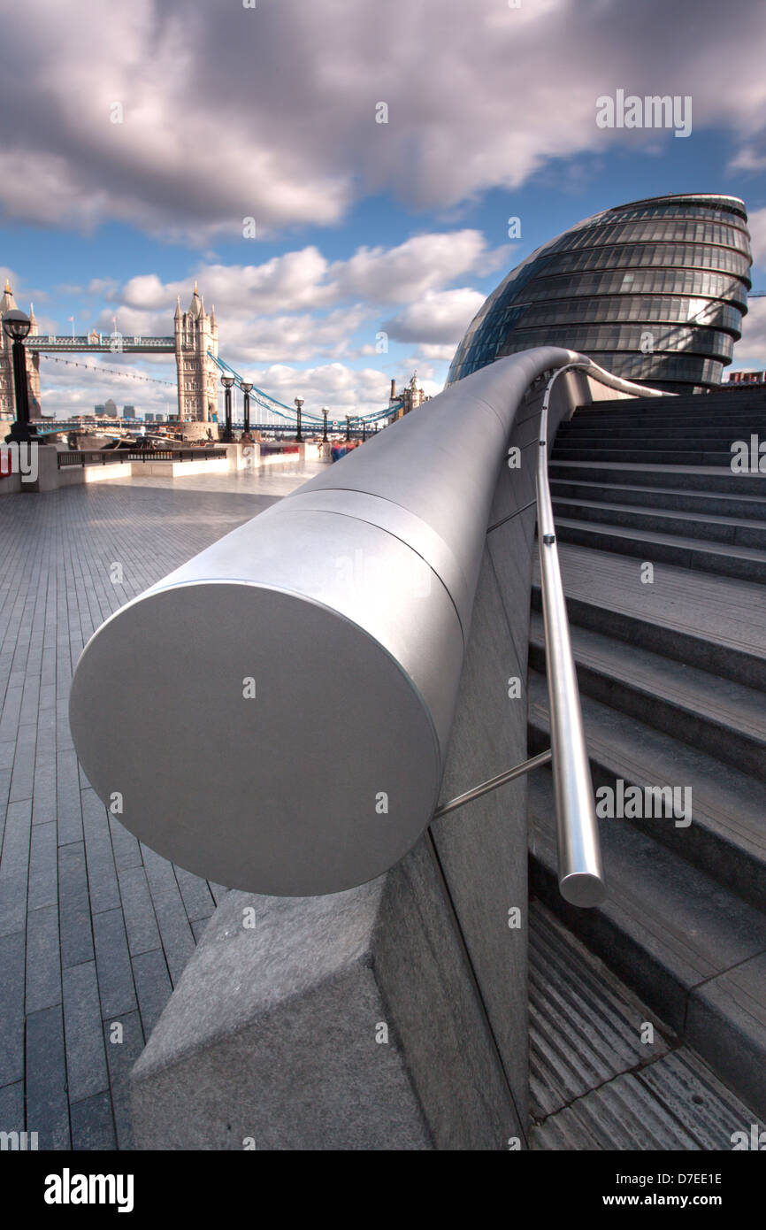 Handrail at More London looking towards City Hall and Tower Bridge, City of London, UK Stock Photo