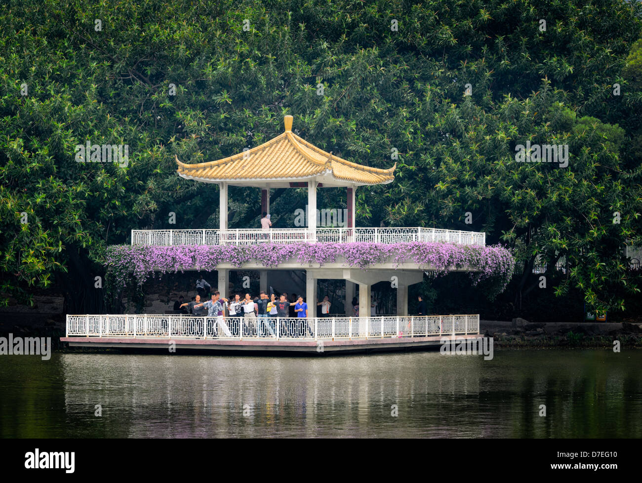 Chinese pagoda in a lake in a park in China. Stock Photo