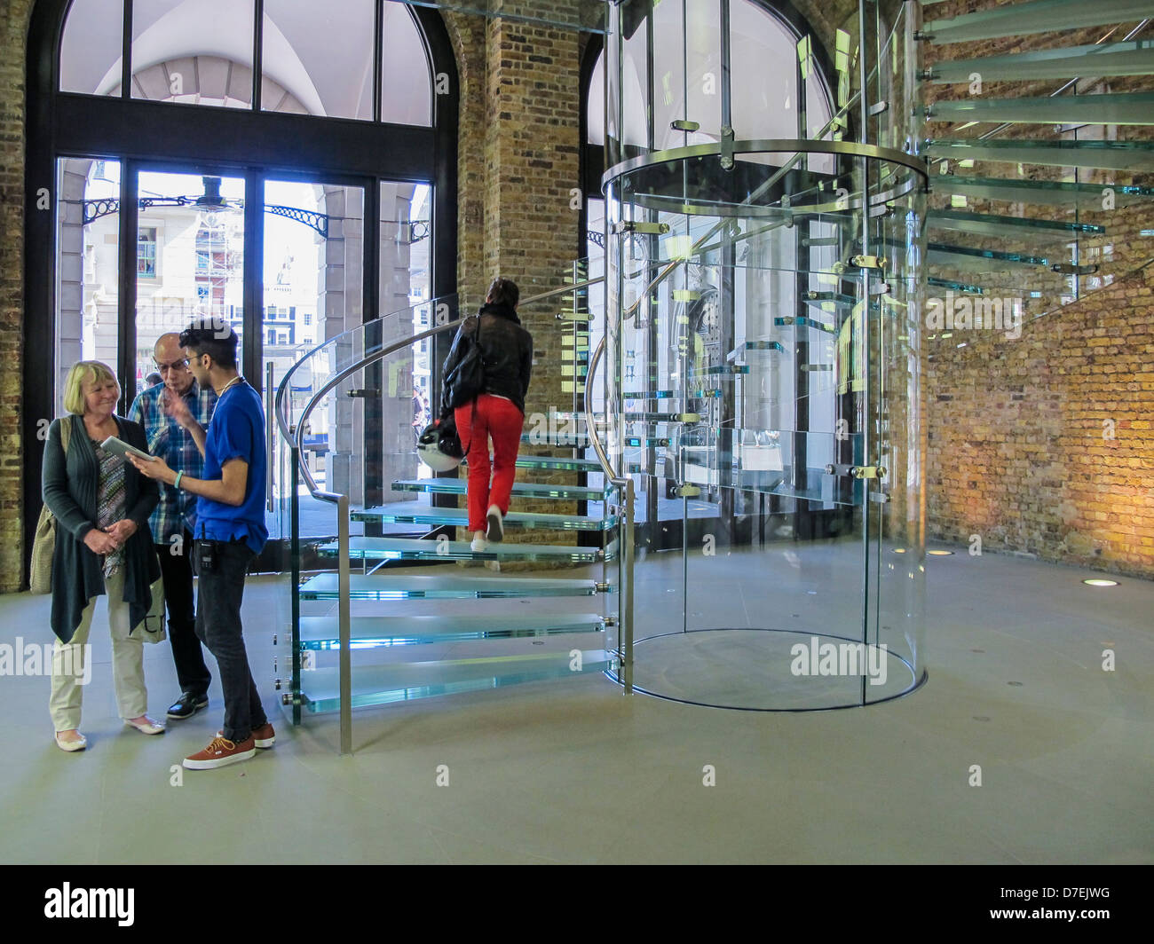 The Apple Store Covent Garden Salesman Helps Shoppers At The