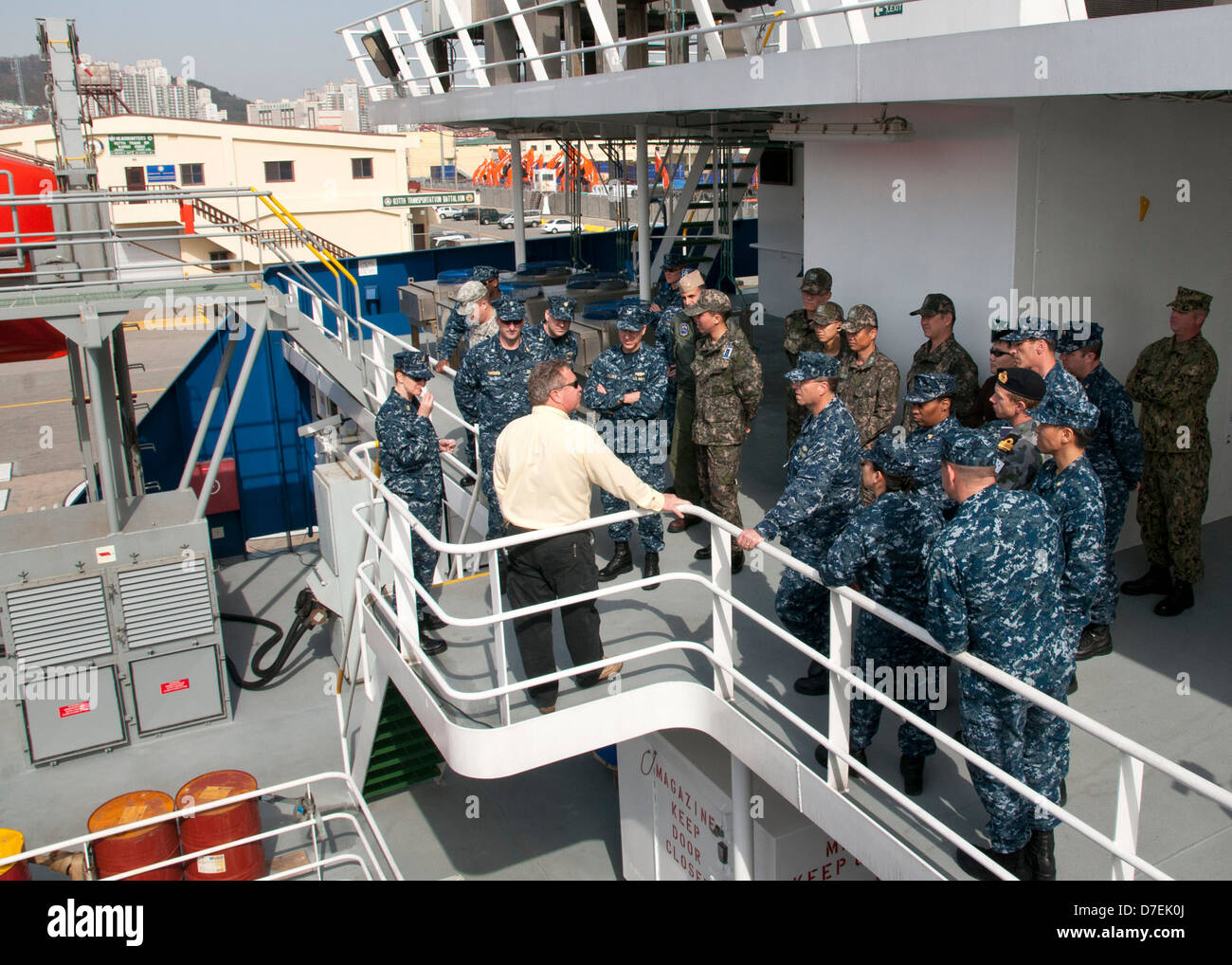 The master of USNS VADM K.R. Wheeler gives a tour. Stock Photo