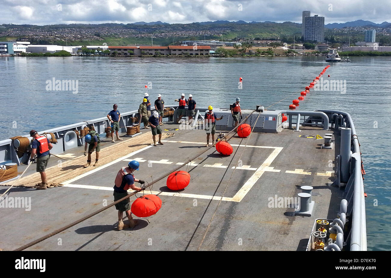 Sailors put out bouys during an exercise. Stock Photo