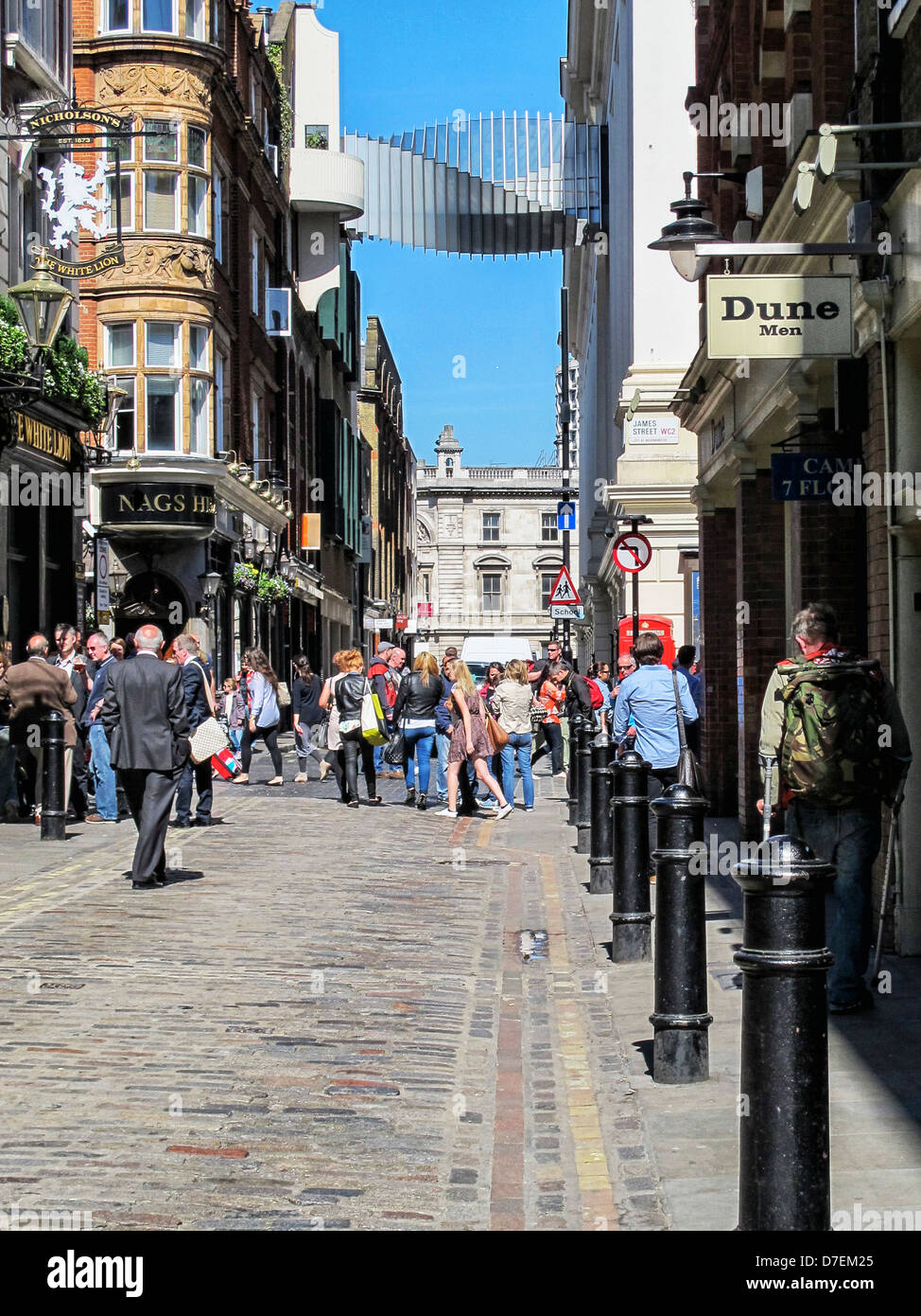 Floral Street view - Traditional pubs & the Bridge of Aspiration joins the Royal Opera House and the Royal Ballet School, Covent Garden, London Stock Photo