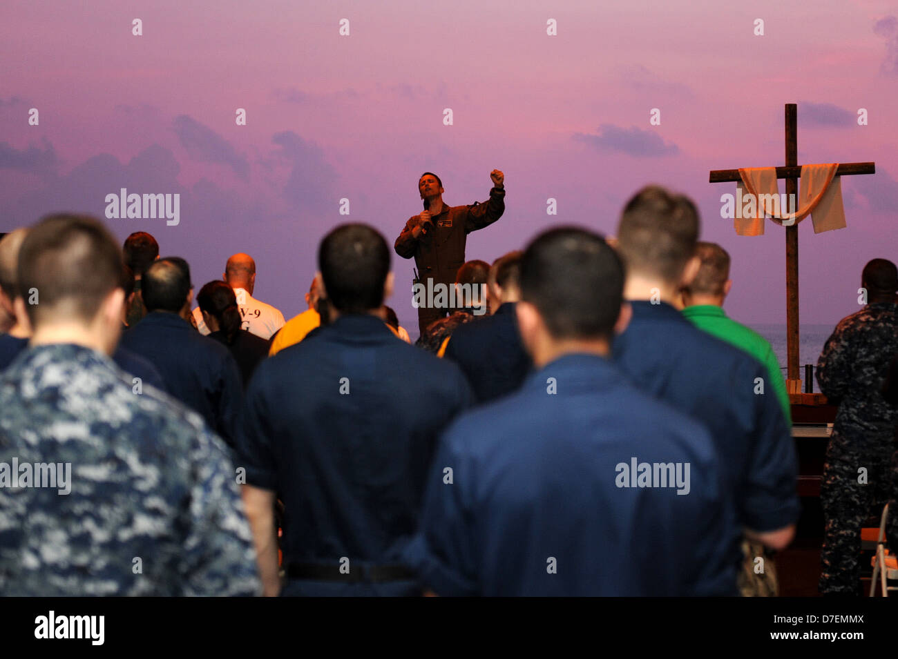 Sailors participate in an Easter service. Stock Photo