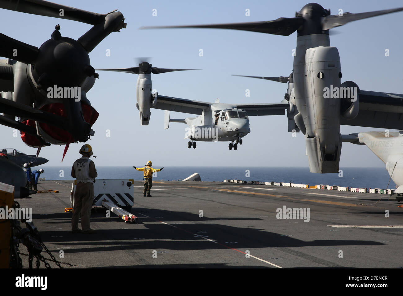An MV-22 Osprey lands aboard USS Kearsarge at sea. Stock Photo