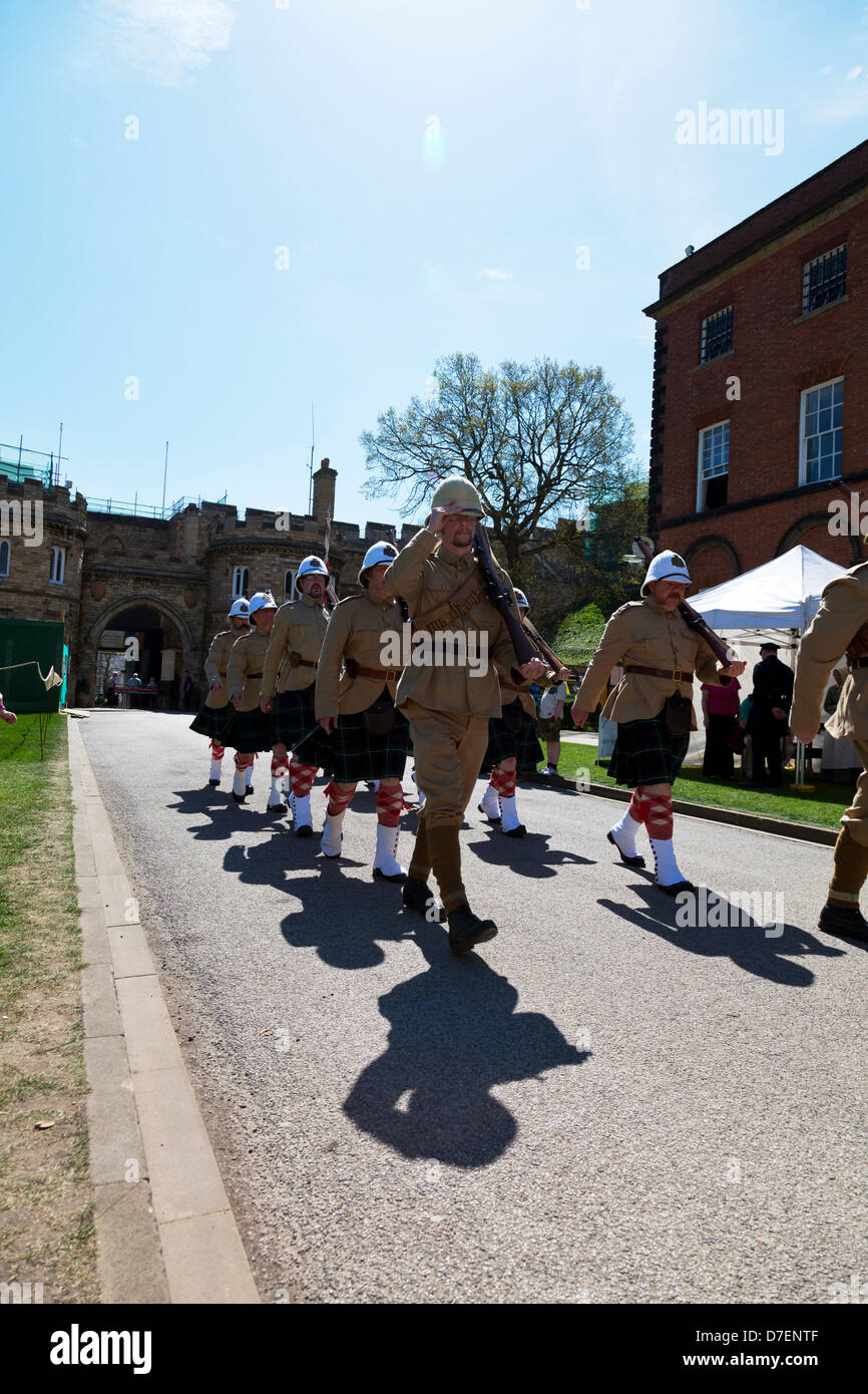 Lincoln, UK. 6th May, 2013. Victorian Weekend at Lincoln Castle in Lincolnshire Uk. People dressed in traditional Victorian The Home Guard (initially 'Local Defence Volunteers' or LDV) was a defense organisation of the British Army during the Second World War. of the era soldier carrying musket Credit: Paul Thompson/Alamy Live News Stock Photo