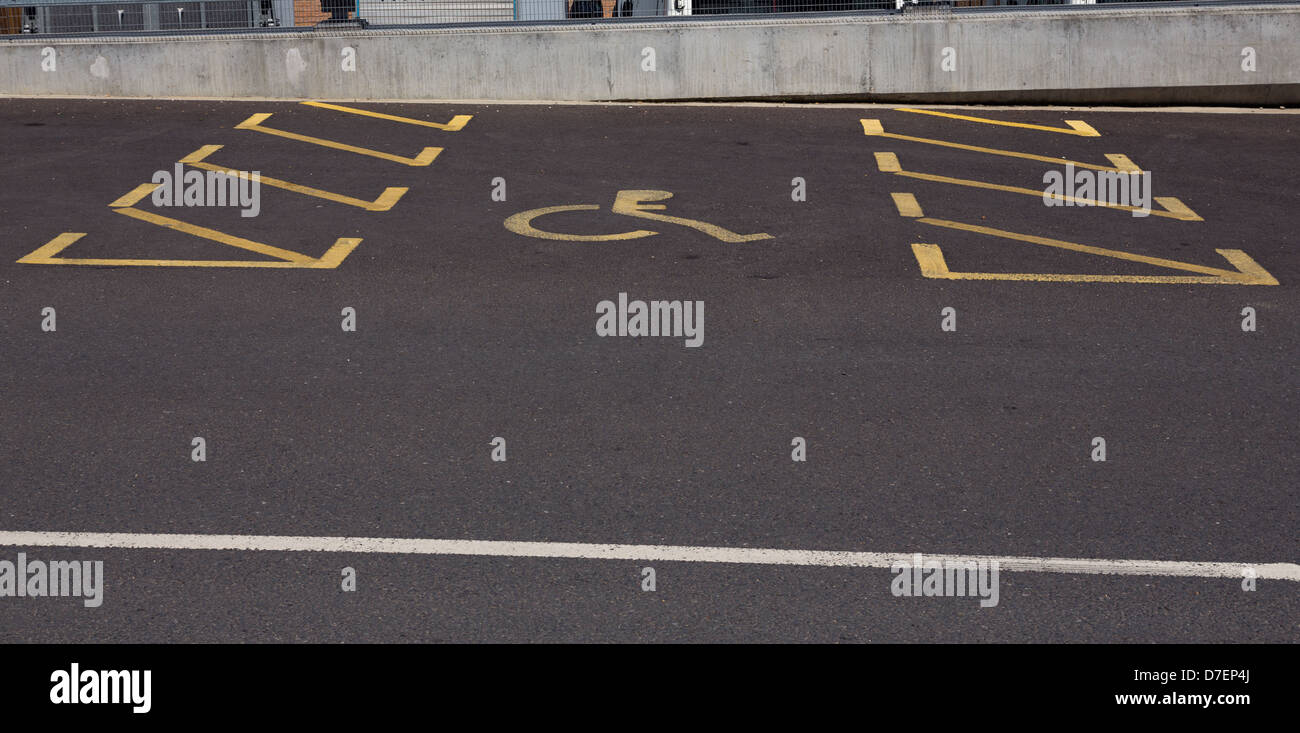 An empty disabled parking space. Stock Photo