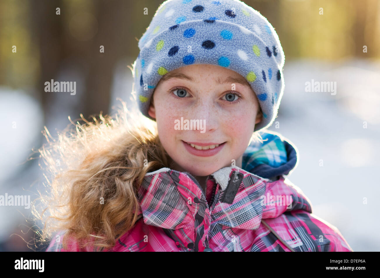 beautiful teen girl wearing winter clothing outdoors Stock Photo