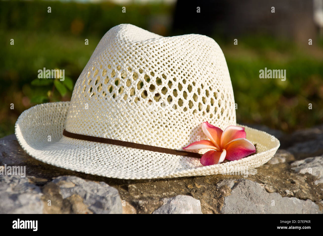 white hat on the ground for summer vacation Stock Photo